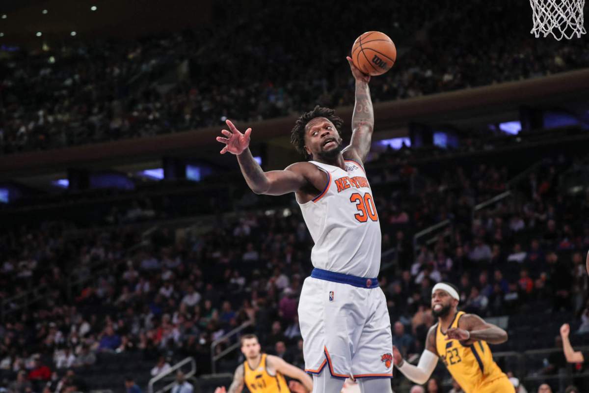 Knicks forward Julius Randle grabs a rebound.