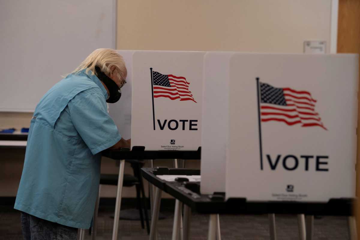 FILE PHOTO: Voters cast their ballot in New Mexico primary