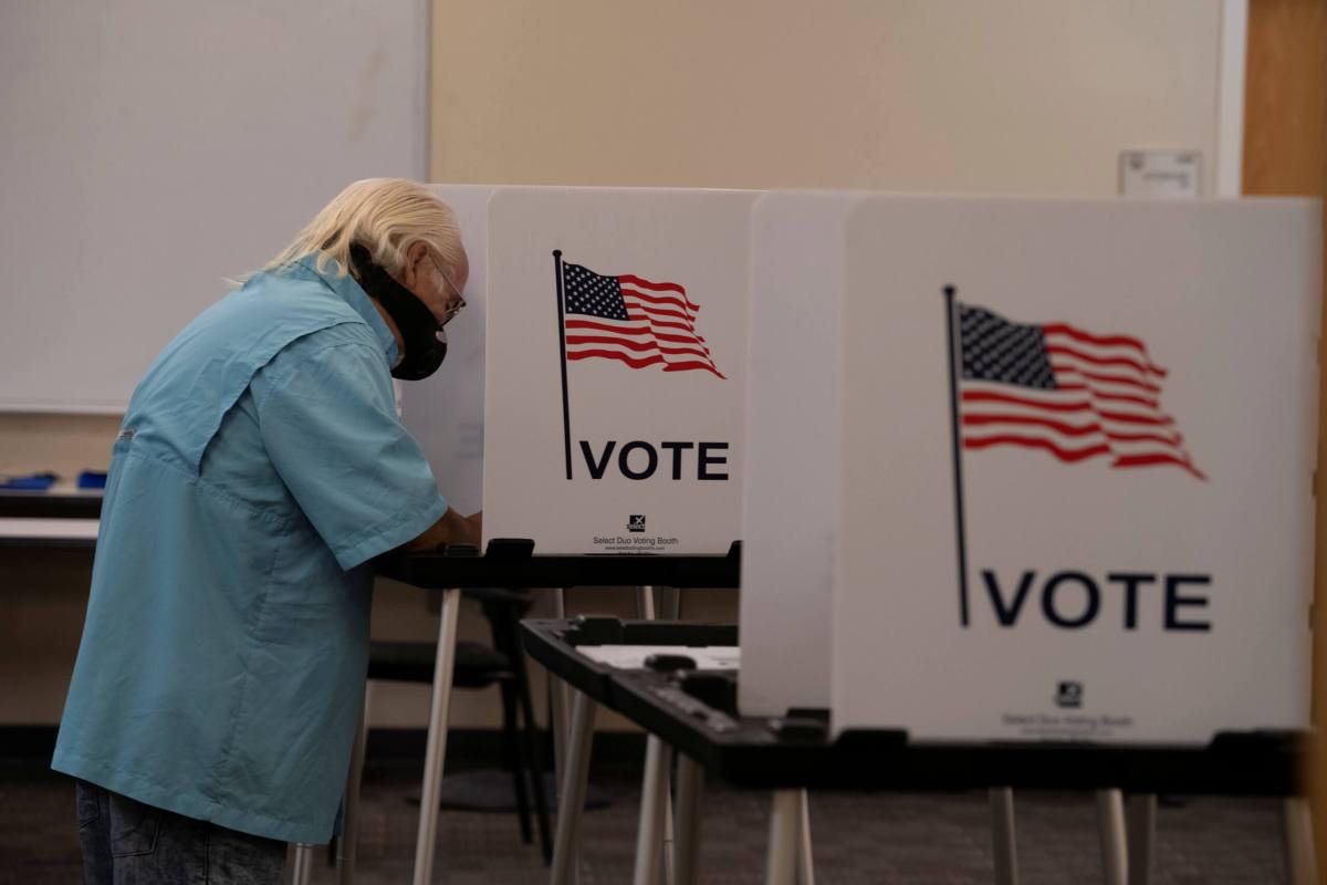 FILE PHOTO: Voters cast their ballot in New Mexico primary