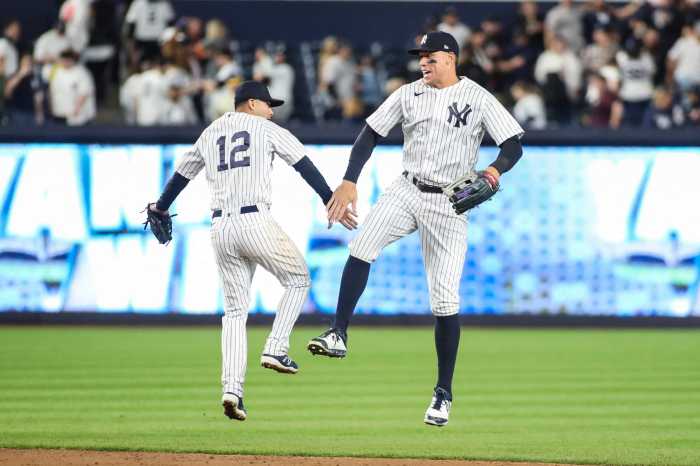 Yankees right fielder Aaron Judge and second baseman Isiah Kiner-Falefa celebrate after defeating the Toronto Blue Jays 4-0.