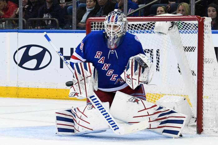 Metropolitan Division Rangers goaltender Igor Shesterkin makes a save against the Winnipeg Jets.