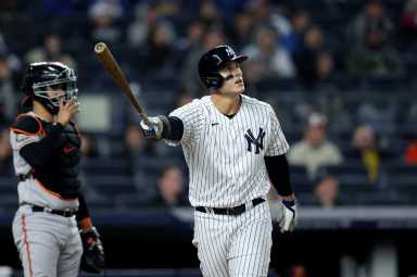 Yankees first baseman Anthony Rizzo follows through on a two run home run against the Baltimore Orioles during the fifth inning.