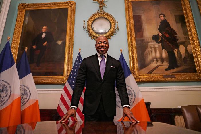 Eric Adams poses at City Hall.