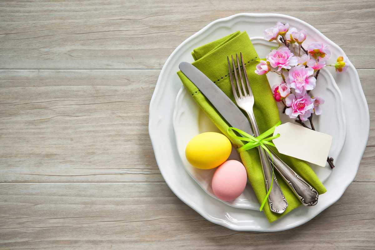 Easter table setting with spring flowers and cutlery