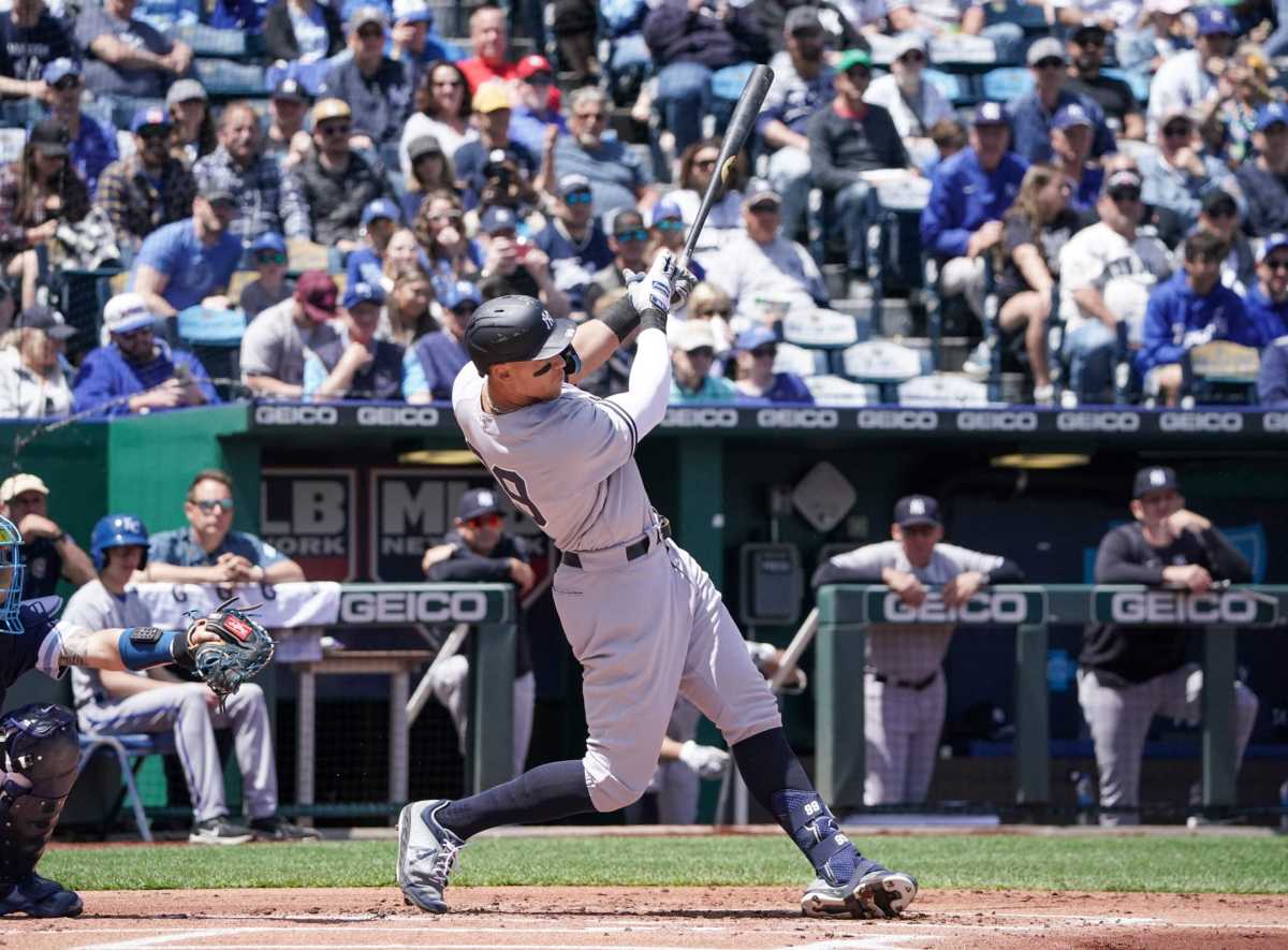 Yankees right fielder Aaron Judge hits a solo home run against the Kansas City Royals in the 1st inning.