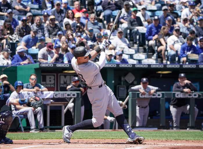 Yankees right fielder Aaron Judge hits a solo home run against the Kansas City Royals in the 1st inning.