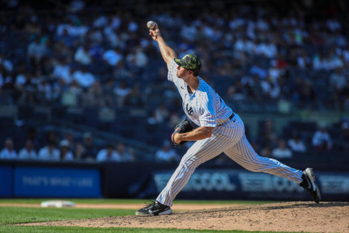 Yankees lefty Clay Holmes delivers a pitch.