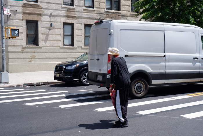 Two 75-year-old Queens women dead in separate crashes 3 A woman attempts to cross Fort Washington Avenue in Washington Heights