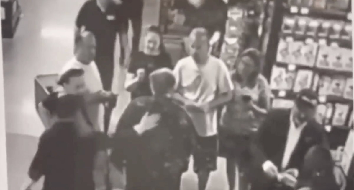 Surveillance video shows the interaction between Rudy Giuliani and Daniel Gill at a ShopRite on Staten Island.