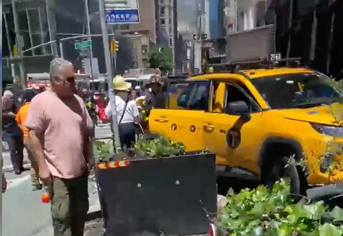 Footage from the scene shows the taxi cab and what looks like a destroyed outdoor dining structure on Broadway and W. 29th Street.
