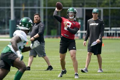 Is Zach Wilson better than Daniel Jones? NFL GMs and coaches say yes 2 New York Jets quarterback Zach Wilson takes part in drills at the NFL football team's practice facility.