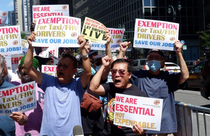 Taxi, Uber, and Lyft drivers demand exemption from congestion pricing 4 Taxi and for-hire vehicle drivers rally for exemptions from the state's congestion pricing plan in Midtown