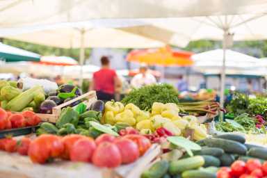 Farmers’ food market stall with variety of organic vegetable.