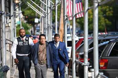 Police arrested a man who they say is connected to the death of a man who was struck and killed by an oncoming subway train in Queens.
