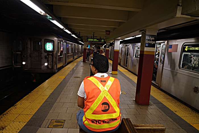MTA service alerts briefly go dark after Elon Musk restricts access to Twitter API 2 An MTA worker watches over the Brooklyn Bridge City Hall subway station