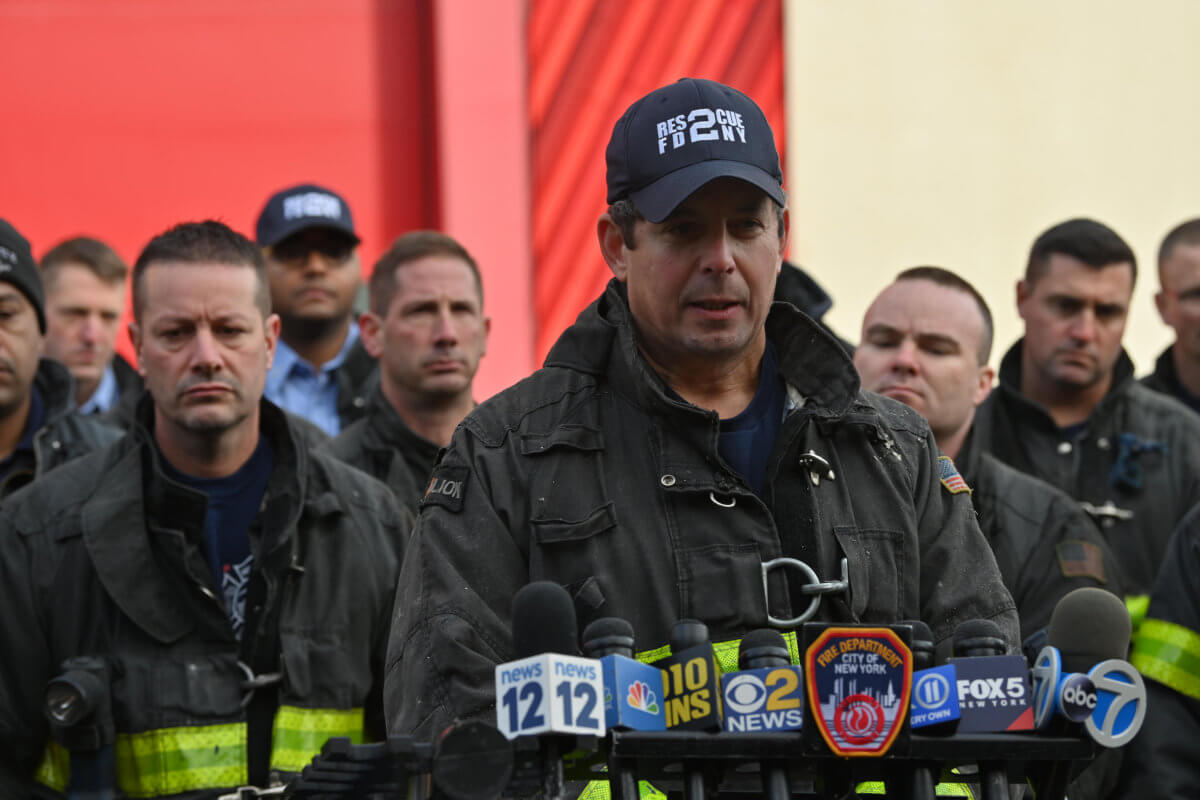 Somber Brooklyn bunting ceremony mourns loss of Firefighter William Moon 7