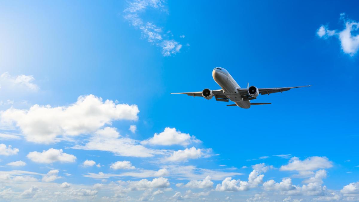 Aerial flying airplane and sky landscape close-up