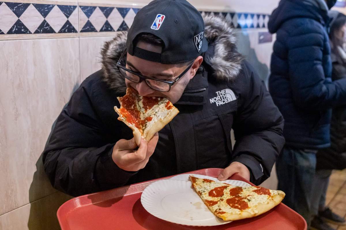 People enjoying their last slices of Lenny's Pizza