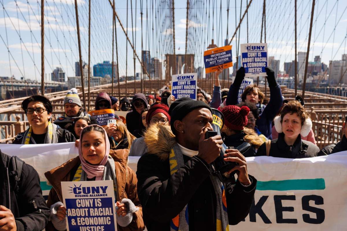 'Not a radical idea': Students, staff, supporters march over Brooklyn Bridge for CUNY funding 10 Students, teachers, union members and elected officials march over the Brooklyn Bridge during the rally