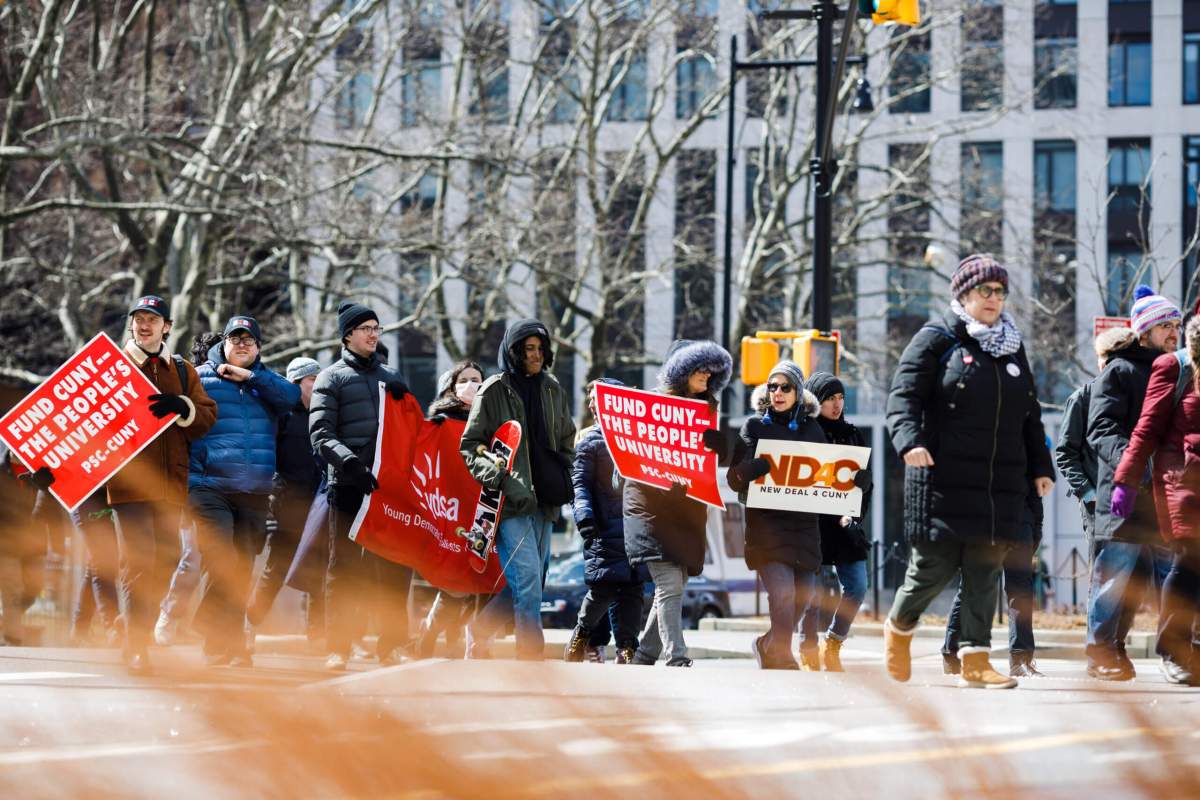 'Not a radical idea': Students, staff, supporters march over Brooklyn Bridge for CUNY funding 8 Students, teachers, union members and elected officials march toward the Brooklyn Bridge.