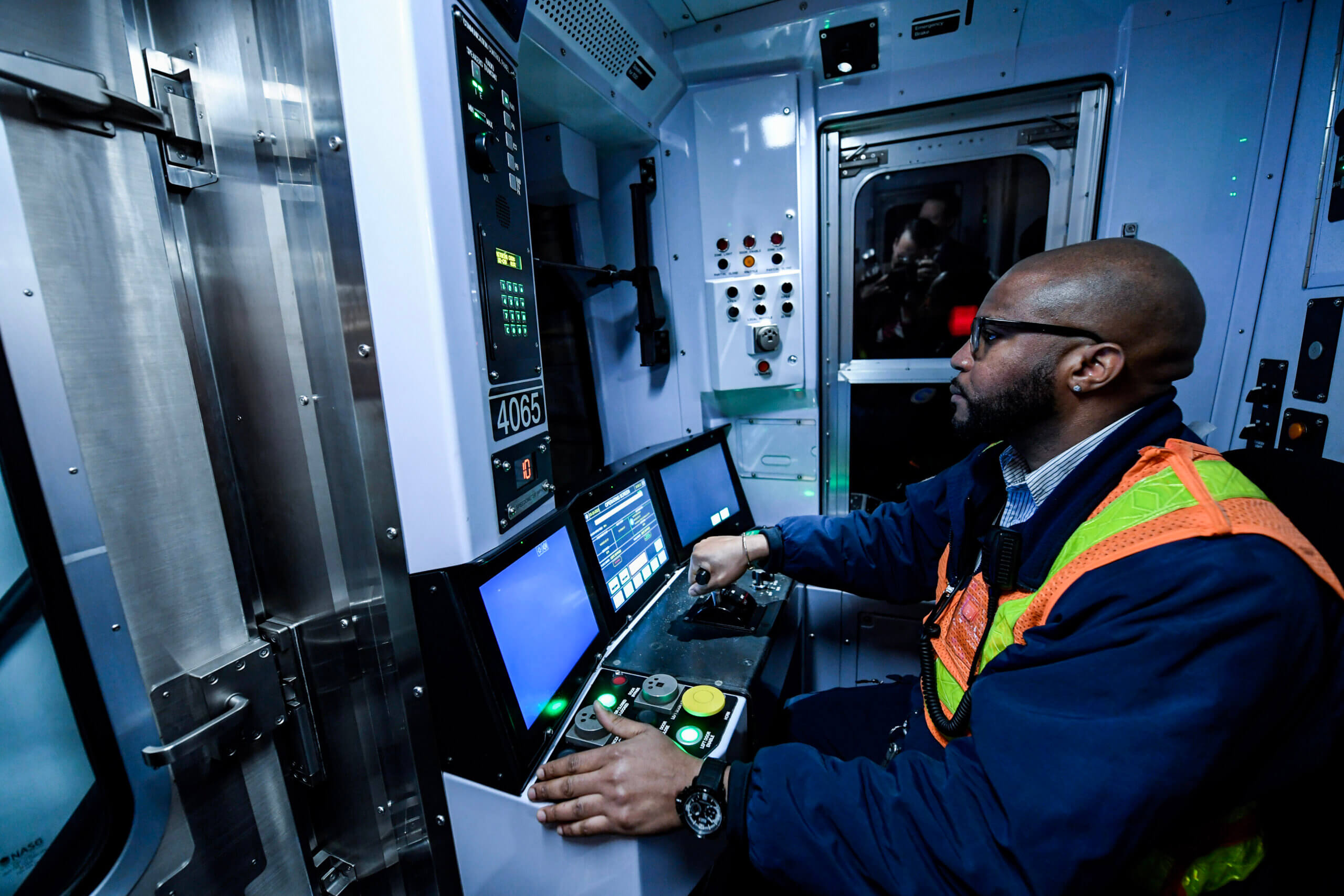 Train Operator Tito Thorpe operates the inaugural run of the new R211 train