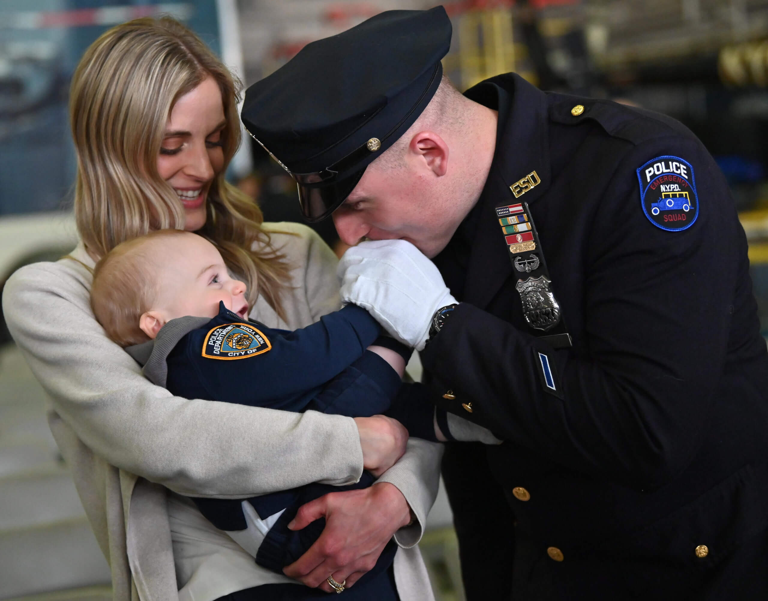 A family legacy continues: ESU cop takes up mantle of NYPD father and FDNY uncle killed on 9/11 11 Joseph Vigiano Jr. with his wife and child