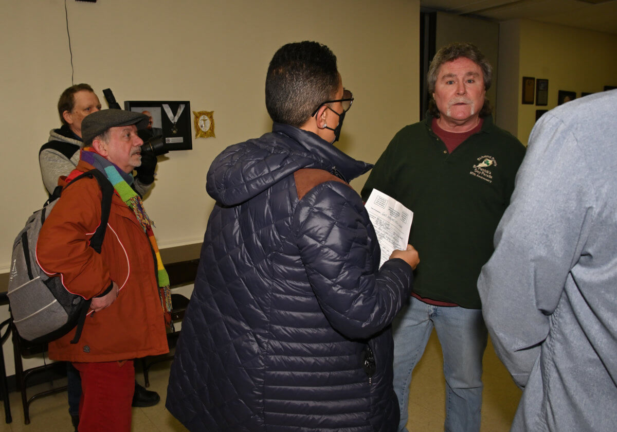 In this picture from 2022, applicants associated with LGBTQ+ groups plead with Parade President Larry Cummings as he rejects their bid to participate in the annual Staten Island St. Patrick’s Day Parade