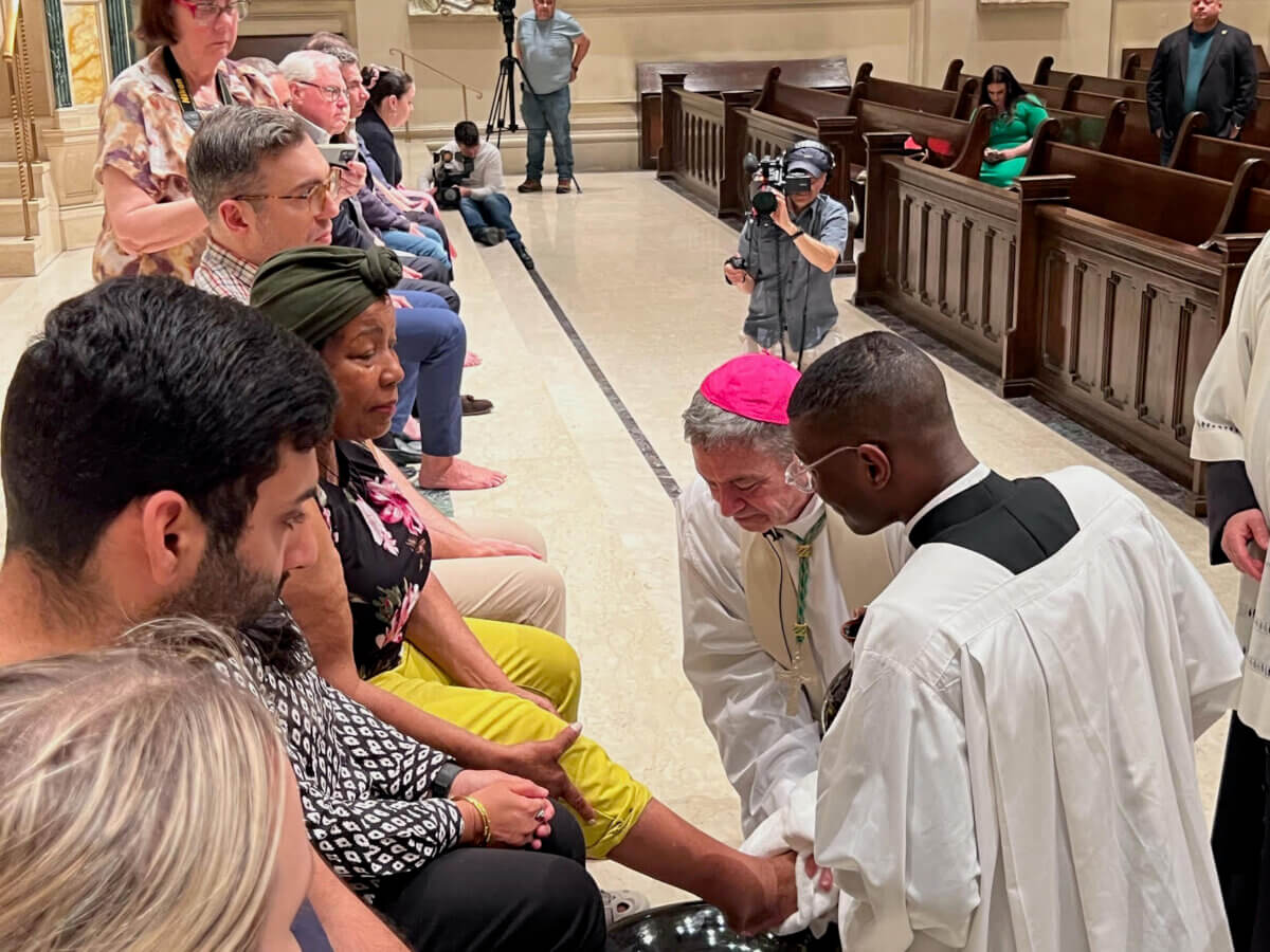 Bishop of Brooklyn Robert Brennan washes feet on Holy Thursday