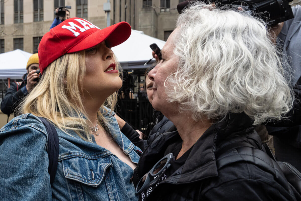 Trump supporter and anti-Trump protestor clash