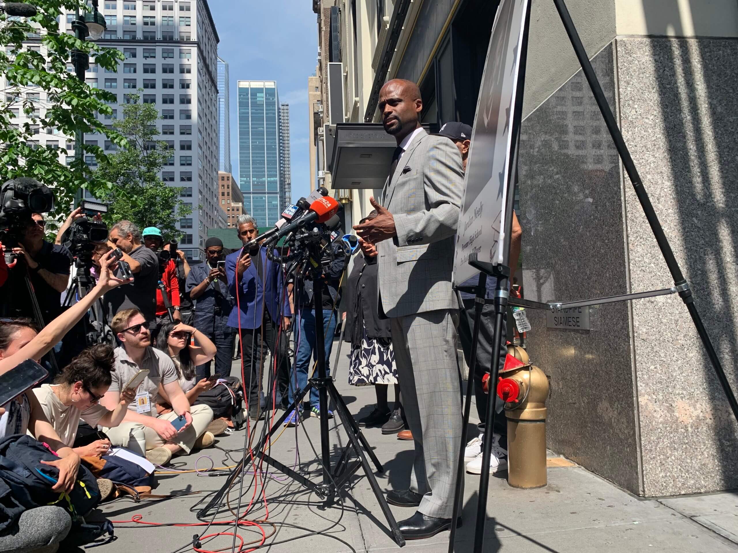 Donte Edwards, speaking to reporters in Midtown Manhattan