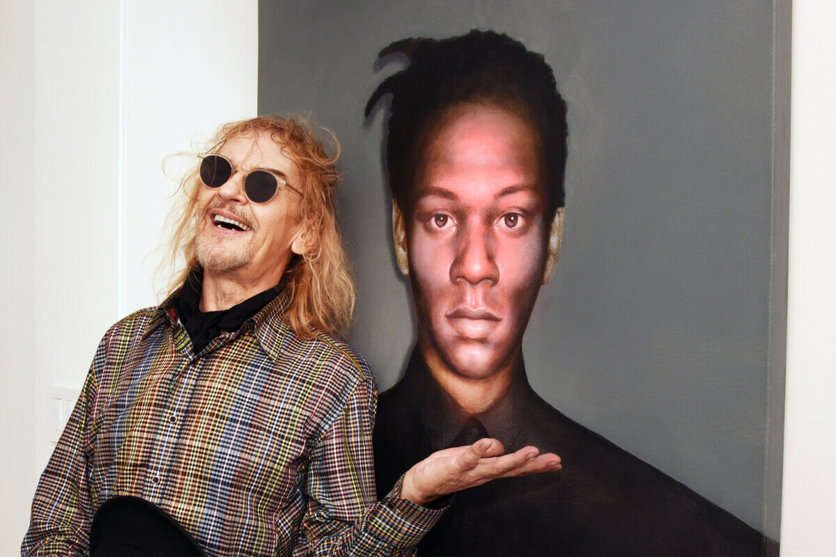 Steding with his portrait of friend and former roommate, Jean-Michel Basquiat