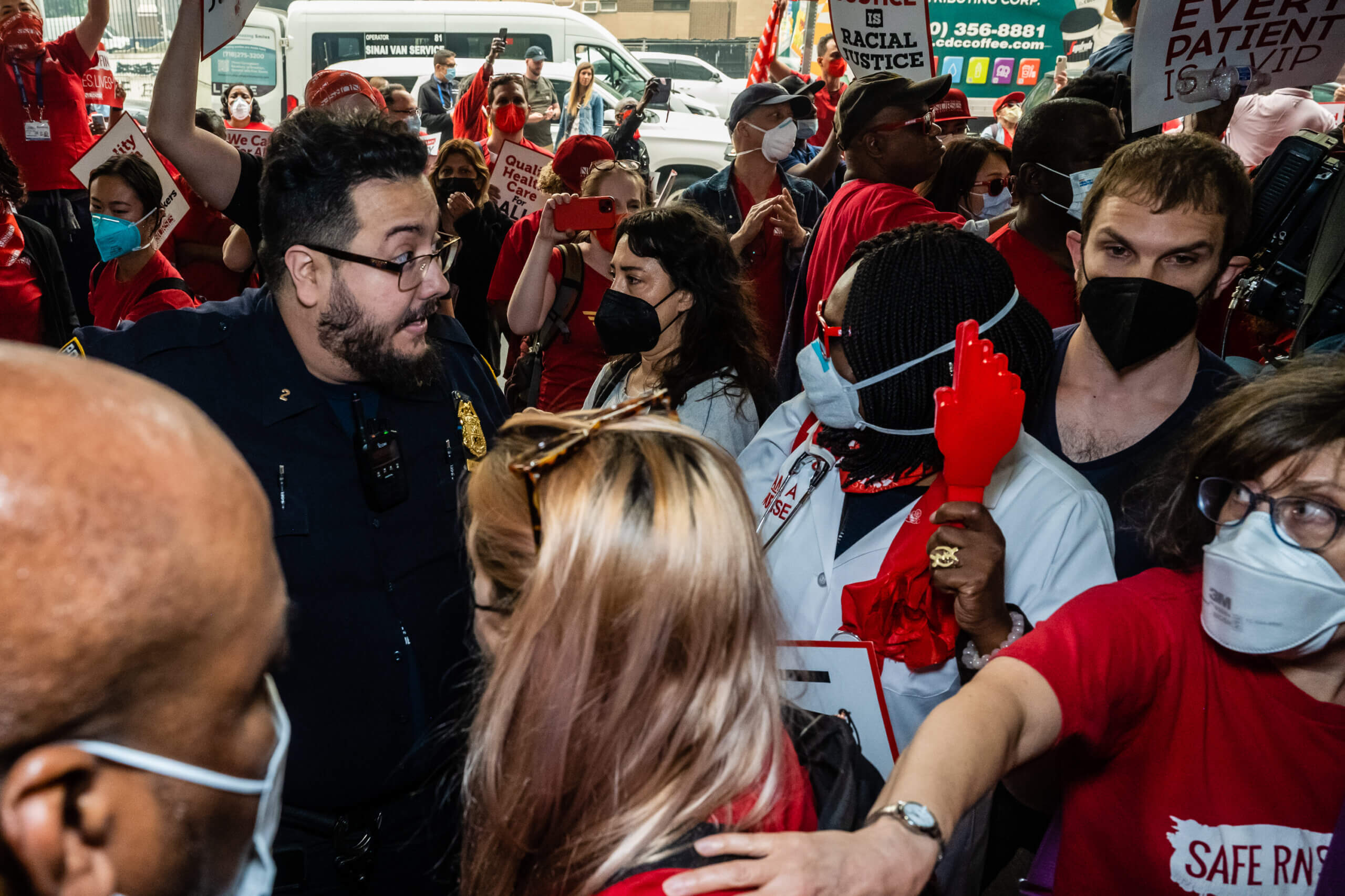 New York Hospital Police try to prevent public hospital nurses from entering Bellevue Hospital after their rally