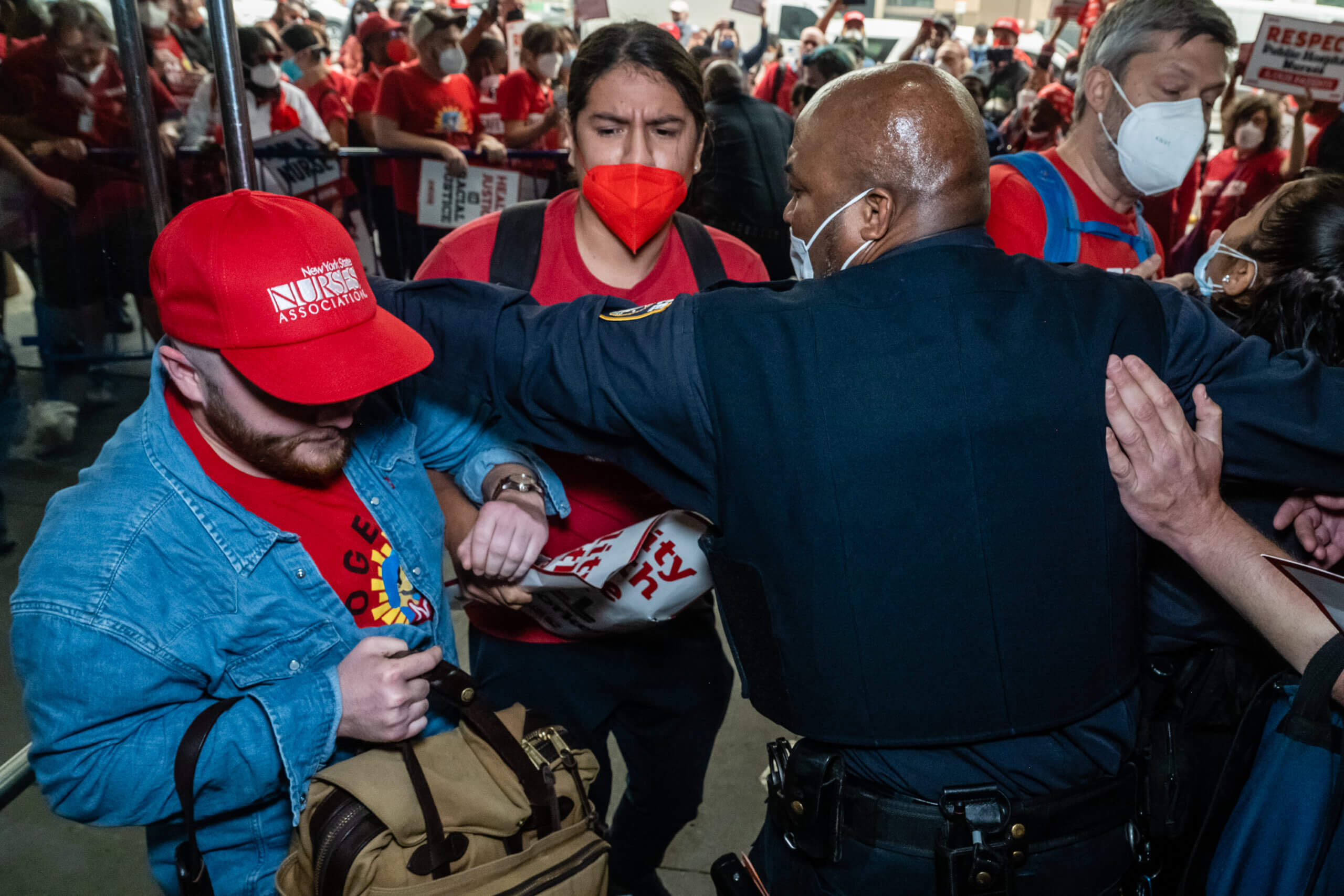 New York Hospital Police try to prevent public hospital nurses from entering Bellevue Hospital after their rally
