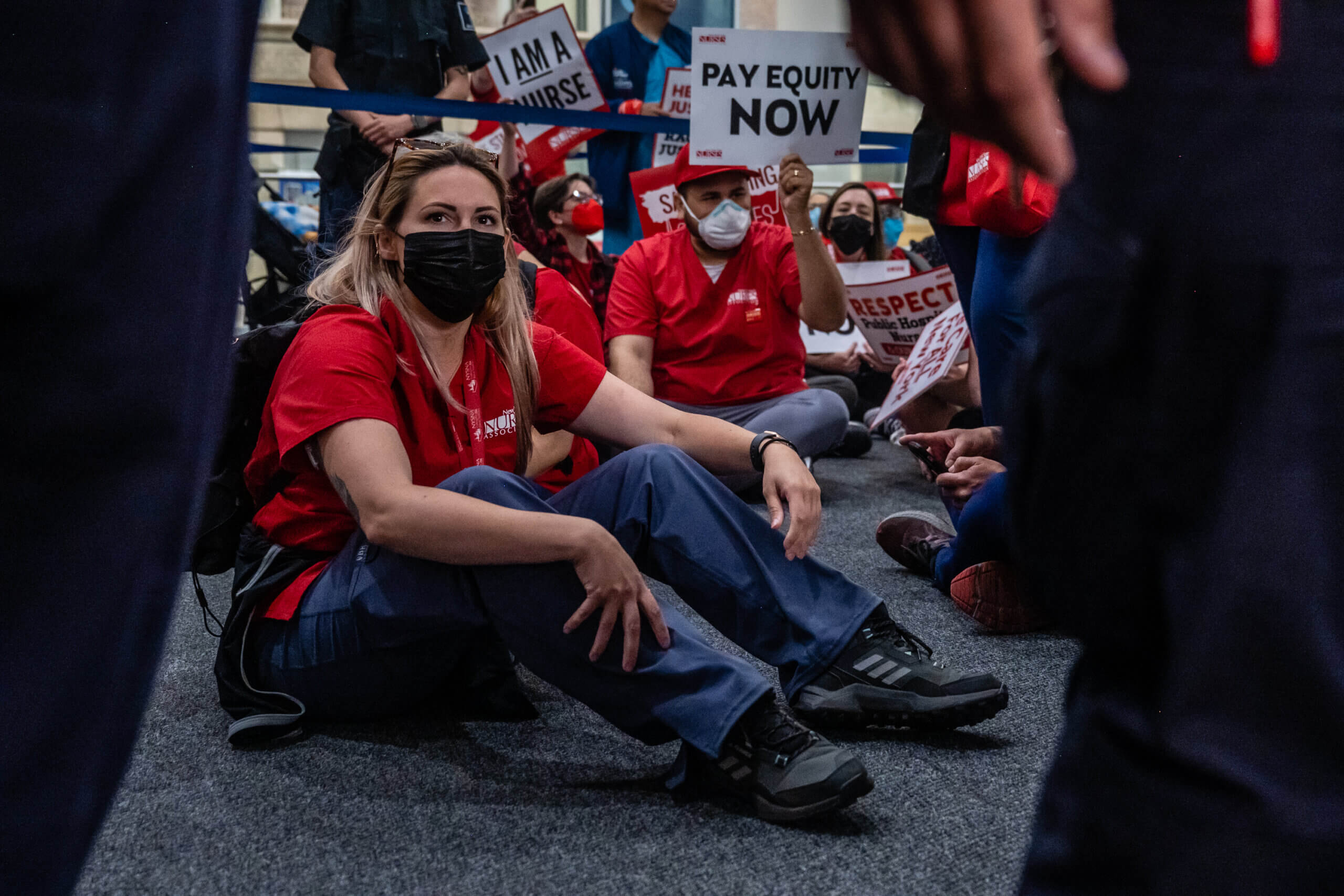 Some NYC public hospital nurses stage a sit-in inside Bellevue Hospital after a rally