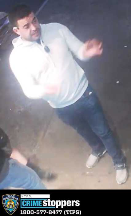 man pictured wanted for a racist attack