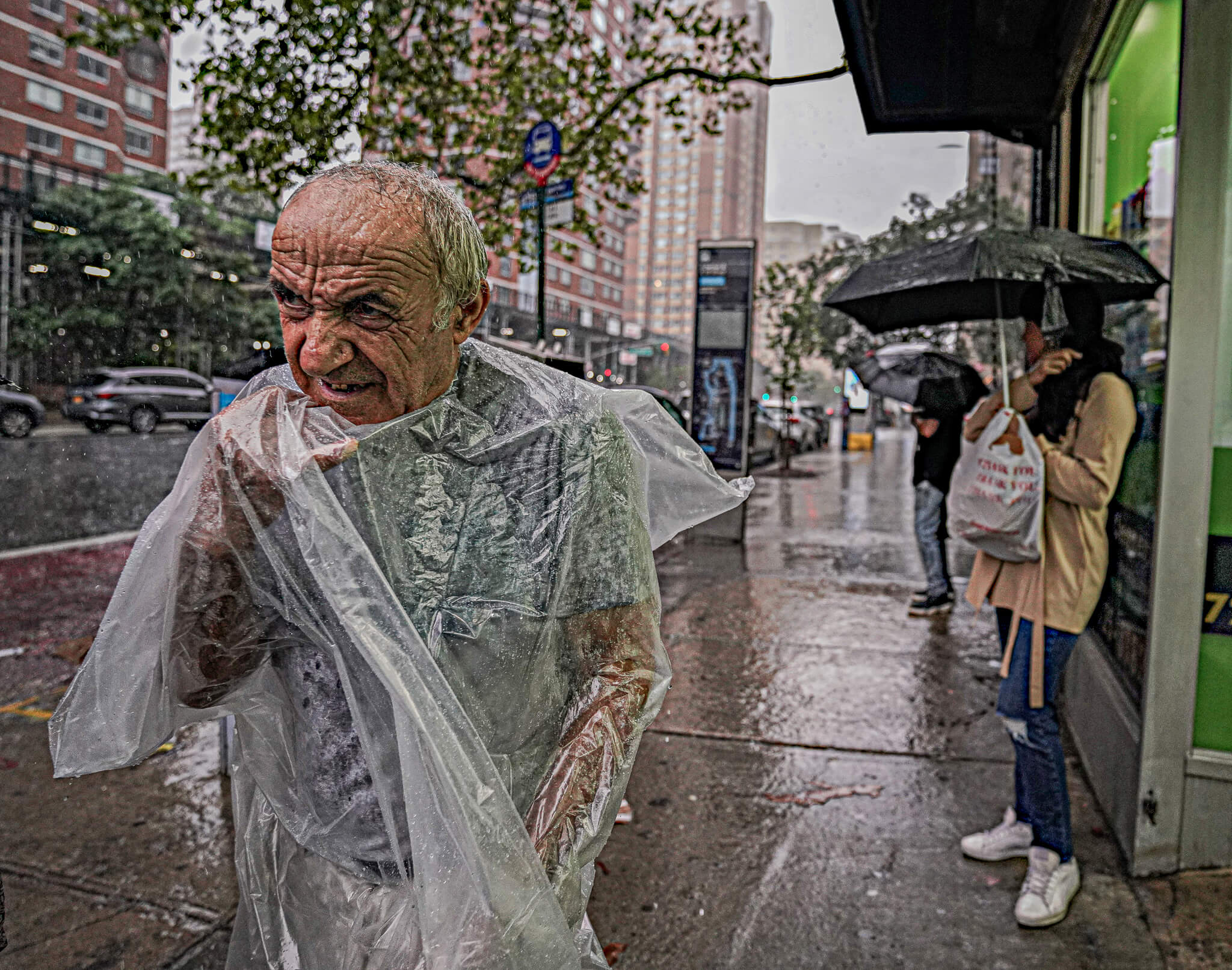 Governor warns New Yorkers to stay off the roads as torrential rain pounds Big Apple 7 New Yorkers braved heavy rain
