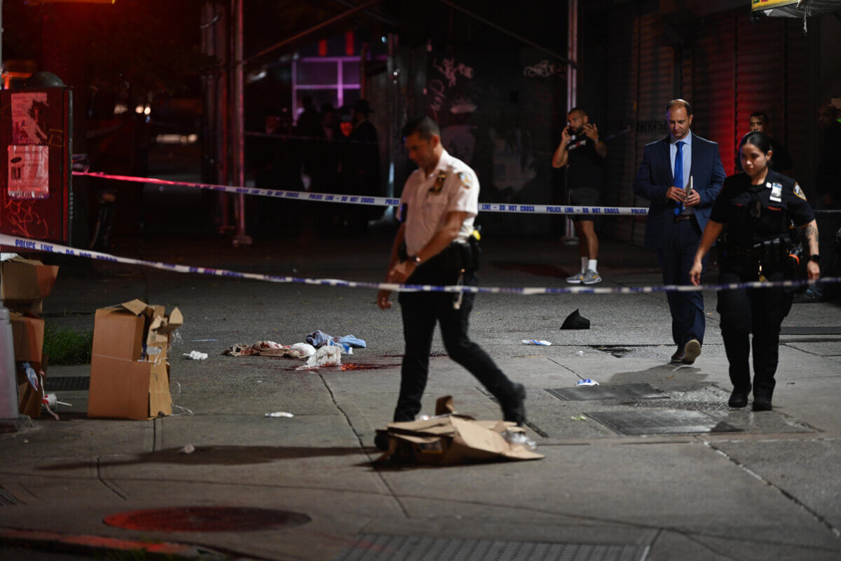 NYPD officers at crime scene in Williamsburg, Brooklyn.