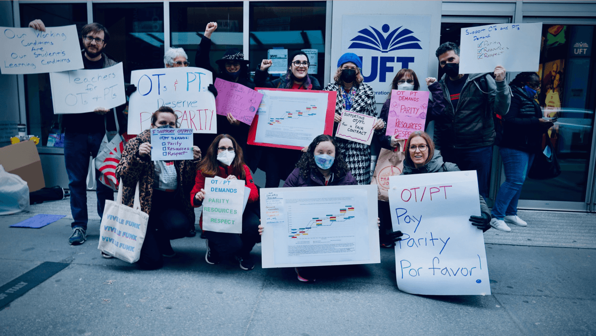 UFT rank and file members rallying for pay parity
