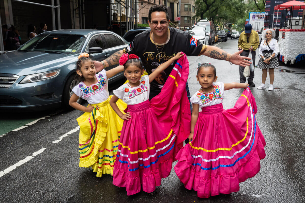 Tito Puente jr. celebrates at the New York Cuban and Hispanic American Parade honoring "Queen of Salsa" Celia Cruz