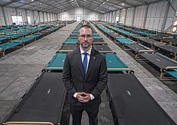 Randall's Island shelter cots with Theodore Long of the Adams administration