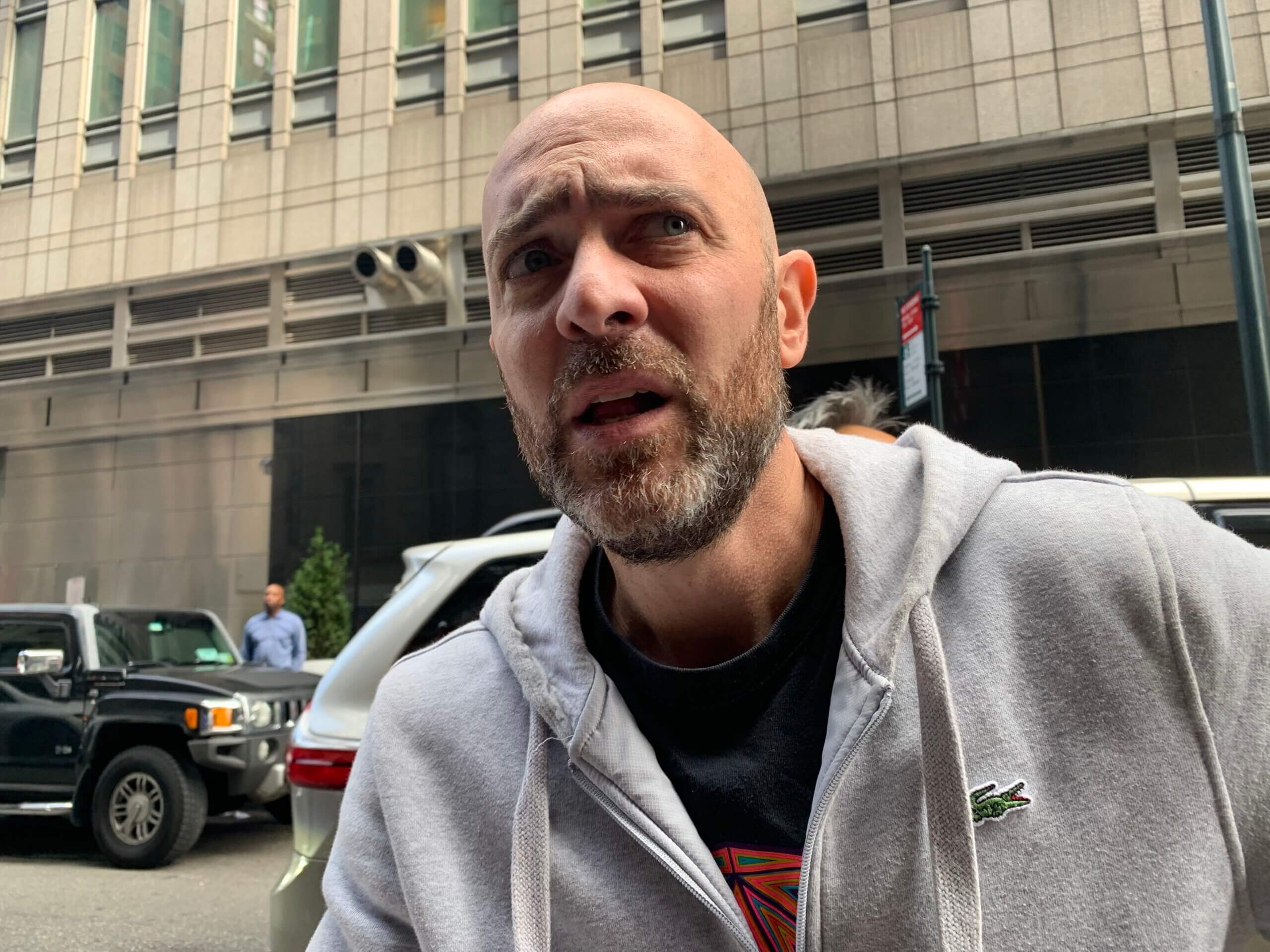 Republican City Council candidate Jonathan David Rinaldi interrupting a press conference on the migrant crisis outside the Roosevelt Hotel