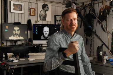 Flloyd with self portraits in East Village studio