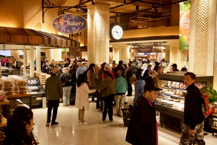 Shoppers line up inside the new Wegmans at 770 Broadway.