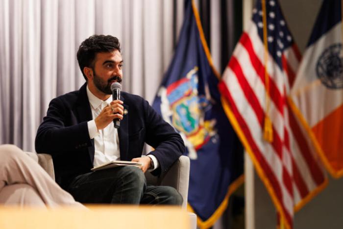 Assemblymember Zohran Mamdani speaks during a town hall.