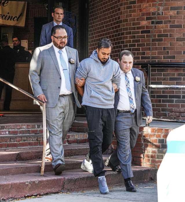 Midtown hate crime suspect Christopher D'Aguiar arrested and escorted by police