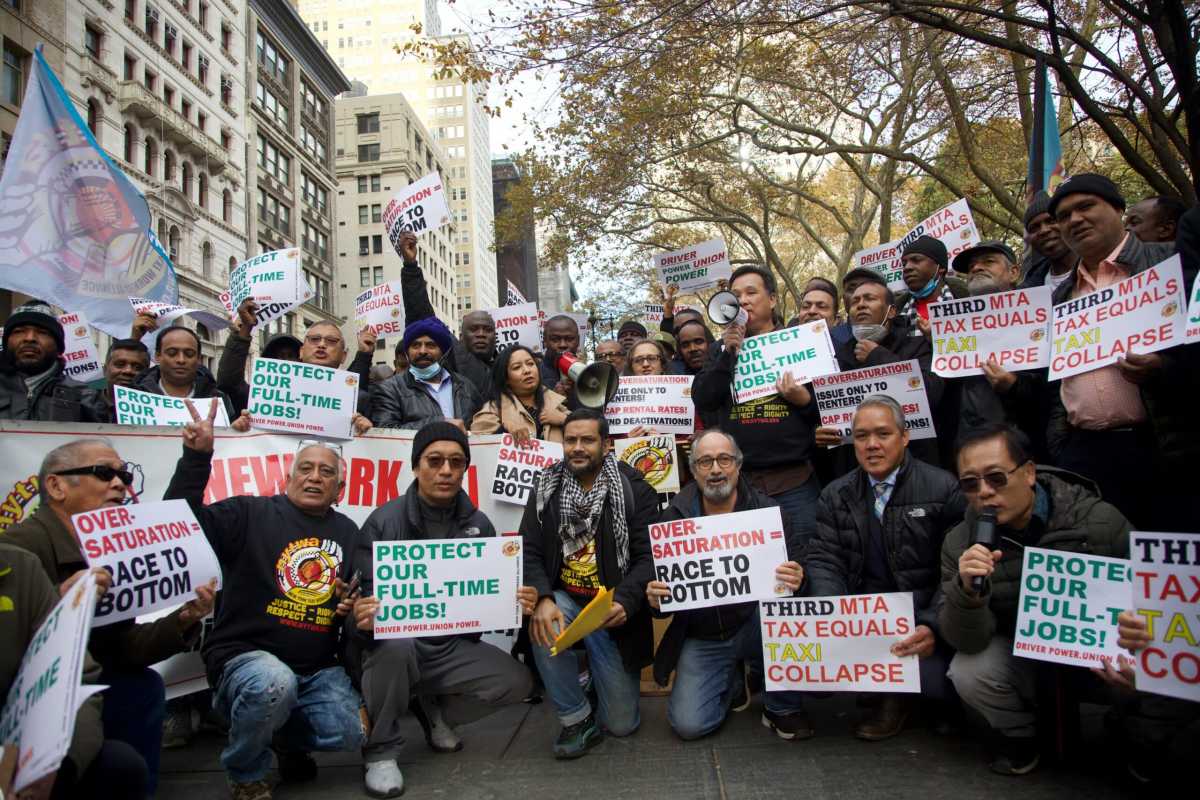 NYC taxi commission and drivers' union reach agreement on ride-share permitting and electric vehicles 2 NYC taxi drivers rally against ride-share cap lift