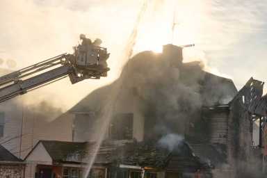 Firefighters operated at a two alarm from the exterior after a roof collapse at 1424 East 2nd Street in Brooklyn