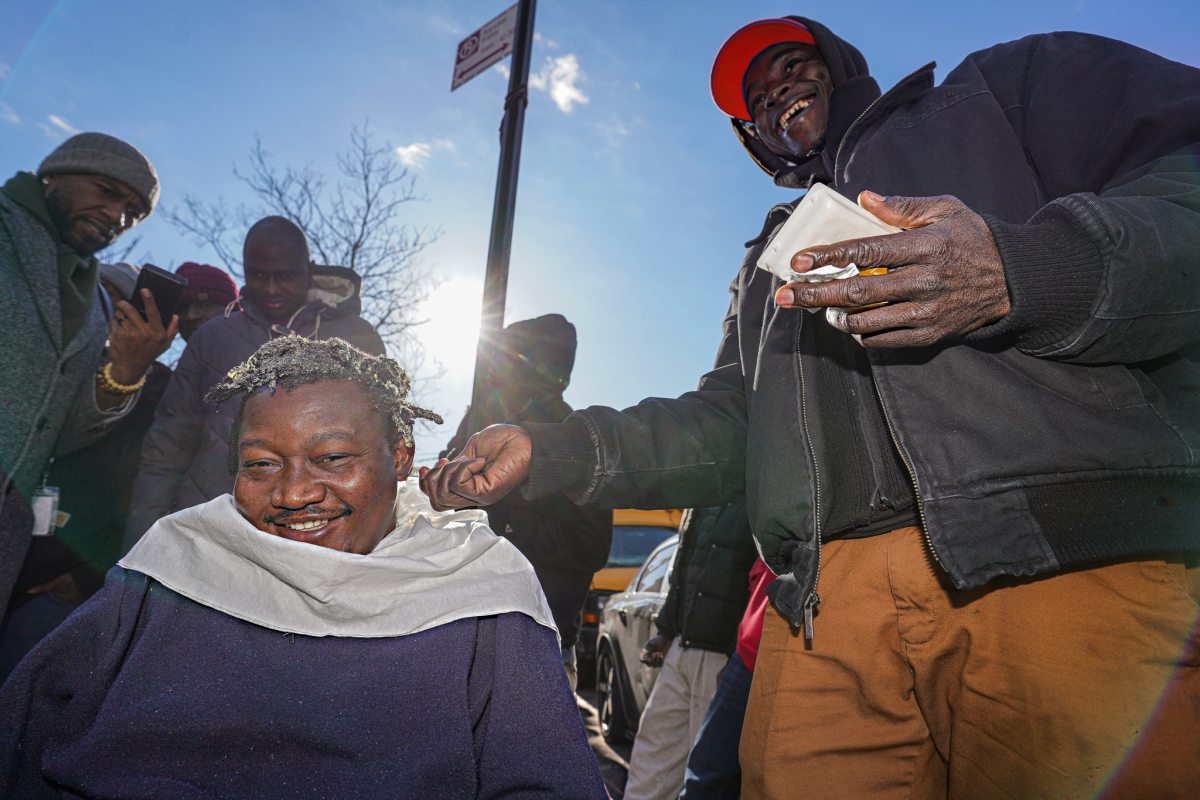 Volunteers, elected officials, and migrants joined together in Brooklyn
