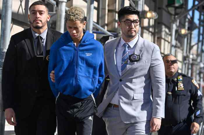 Perp walk for migrant teenager connected to Midtown cop assault after Queens shoplifting arrest