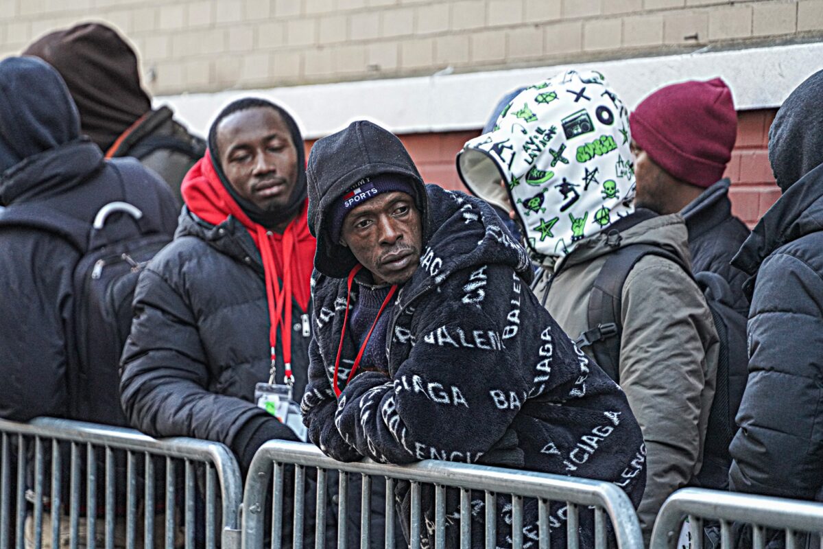 Migrant crisis | Adams rebukes feds' reported claim his admin hasn't 'stepped up to plate' in collecting aid 3 Migrants wait for services